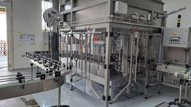 A newly installed filling machine after CIP and COP cleaning ready to start filling beverages into PET bottles